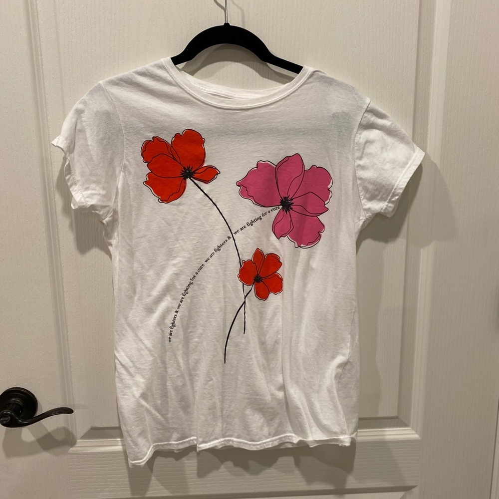 Carolina Herrera Key to the Cure shirt